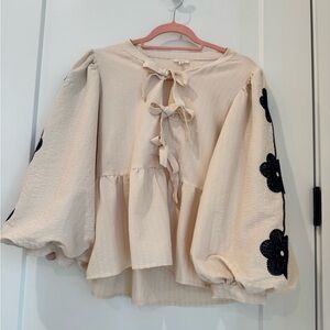 JODIFL Cream Blouse with Black Floral Details